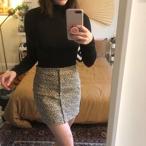 Black turtleneck bodysuit